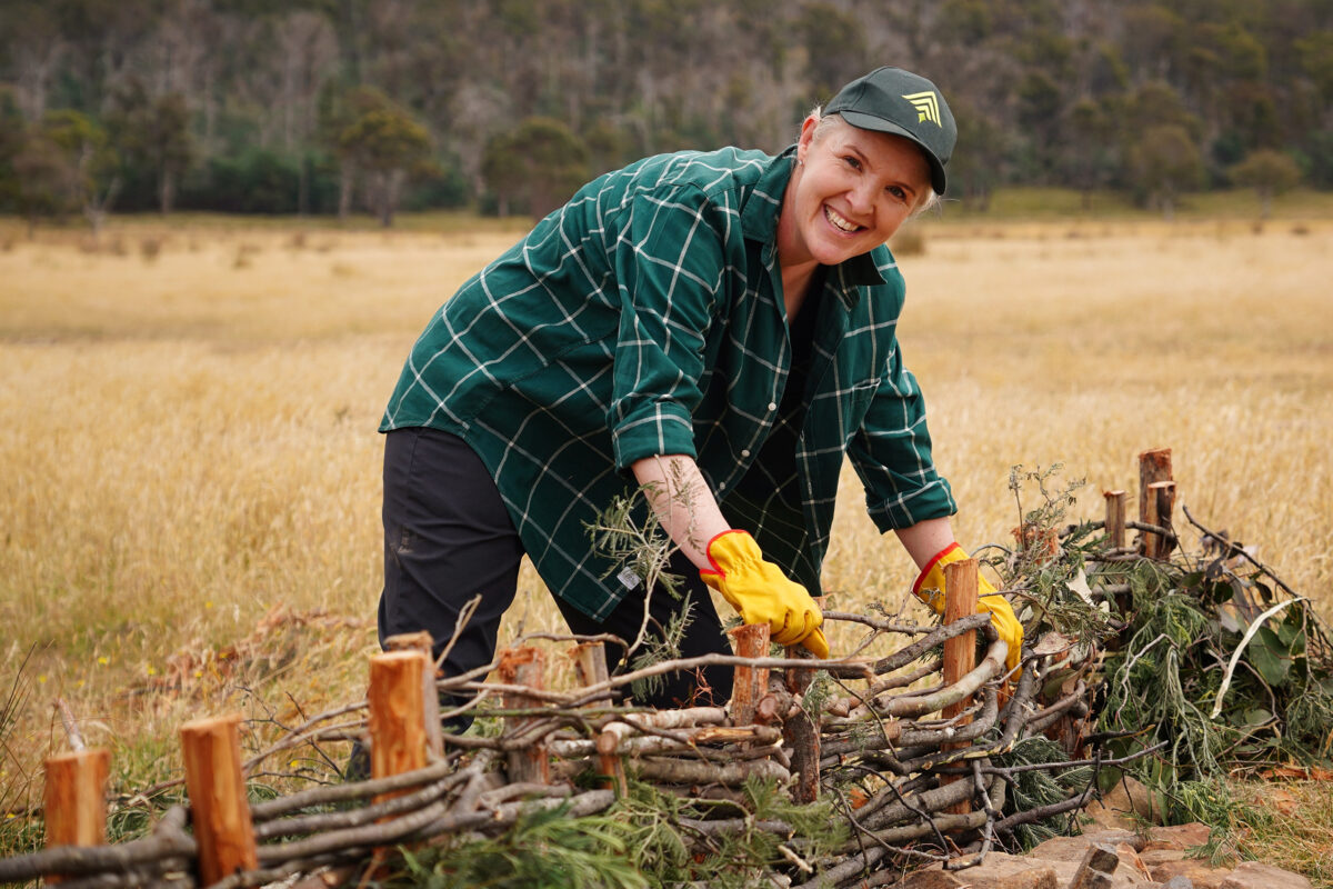 Wedgetail Founder Lisa Miller building a leaky weir at The Quoin. Photo credit James Hattam.